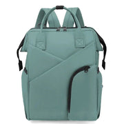 Cloudscape Modern Diaper Backpack in green, front view, displaying its stylish aesthetic, ample storage, and practical features for everyday use.